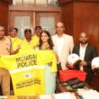 IIFL foundation, Yashlok welfare foundation provide recycled PVC raincoats to Mumbai police